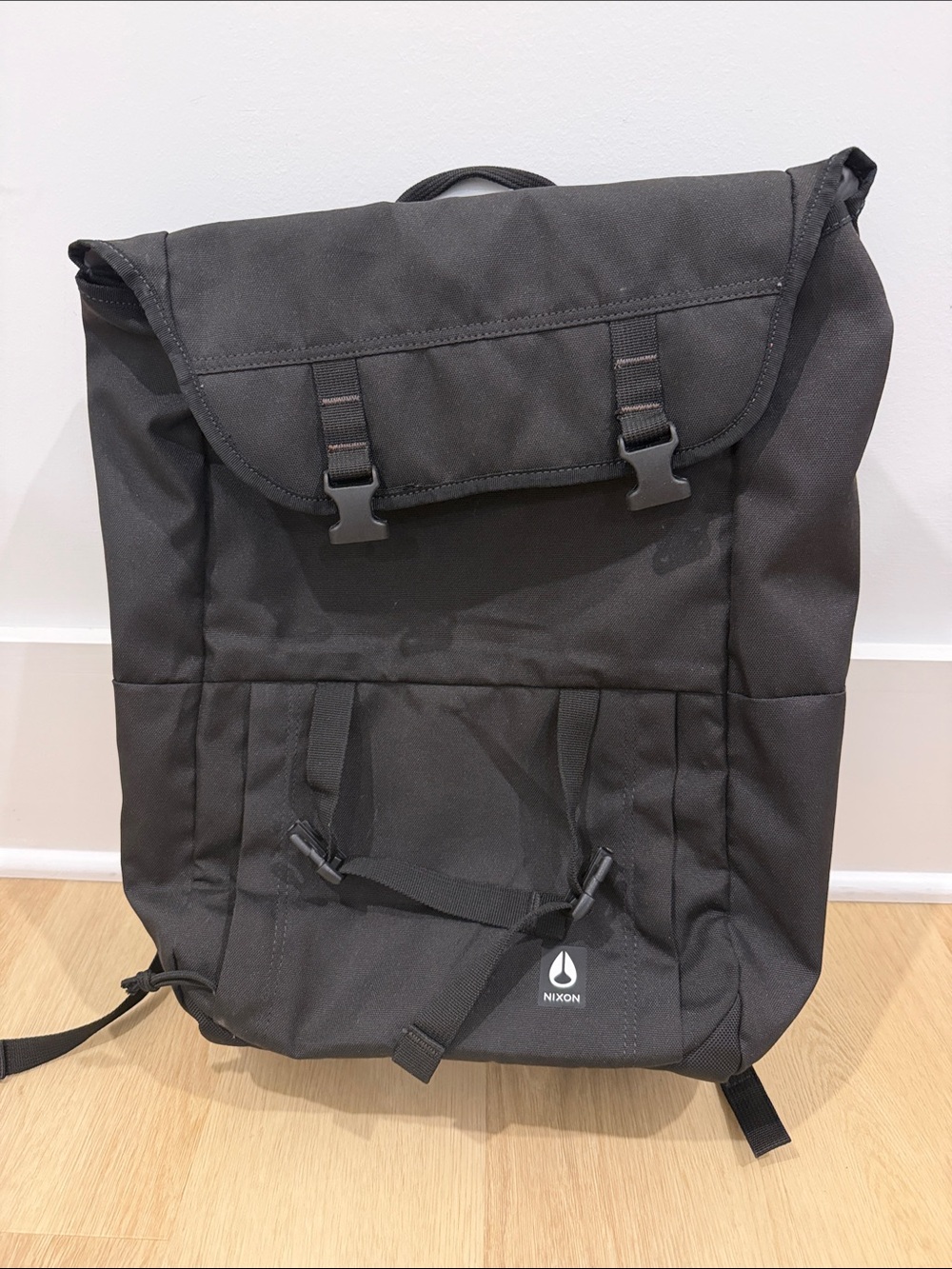 Nixon Black Roll-Top Backpack with Buckle Closure